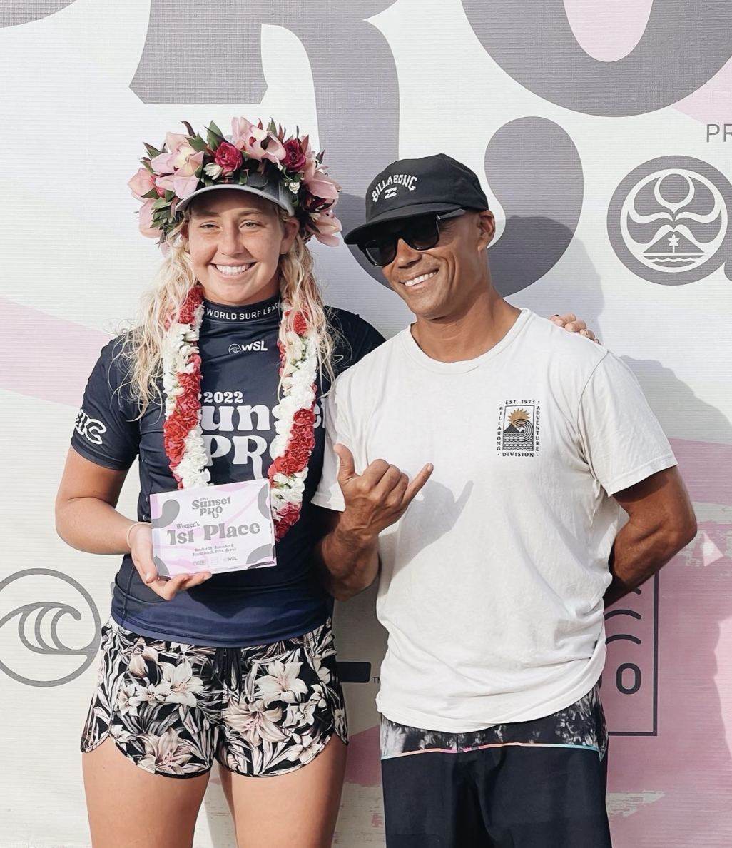 Rainos Hayes with an athlete he coaches